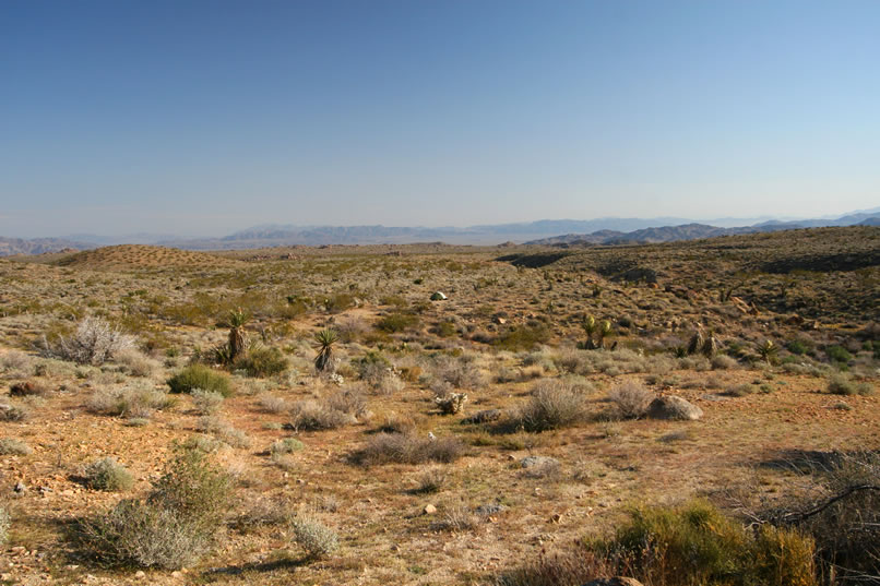 This photo and the next show the tent turning into a small speck on the plain below.