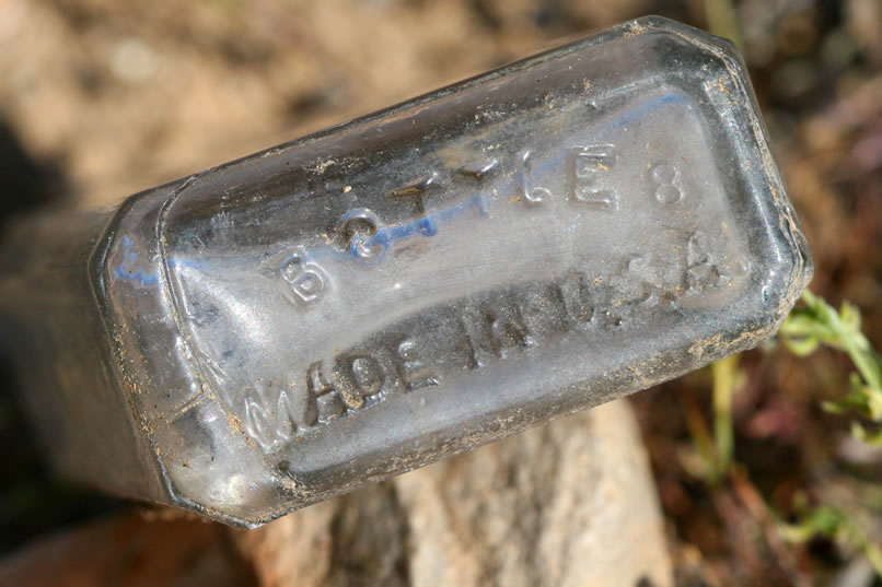 This is a closer look at the bottom of the Chamberlain's medicine bottle.