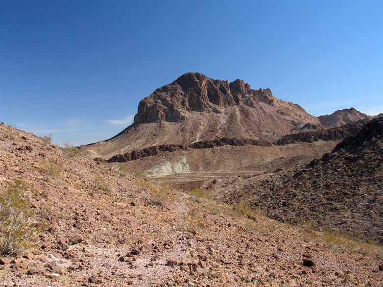 It eventually crests a low saddle and provides a great view of Thumb Peak.