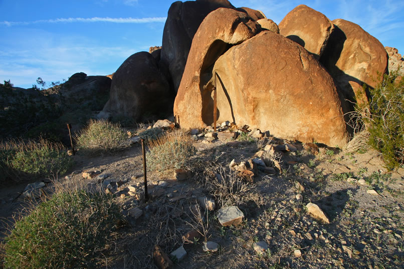 A lot was going on around this boulder pile.  The first thing we see are the poles that used to support a tent.