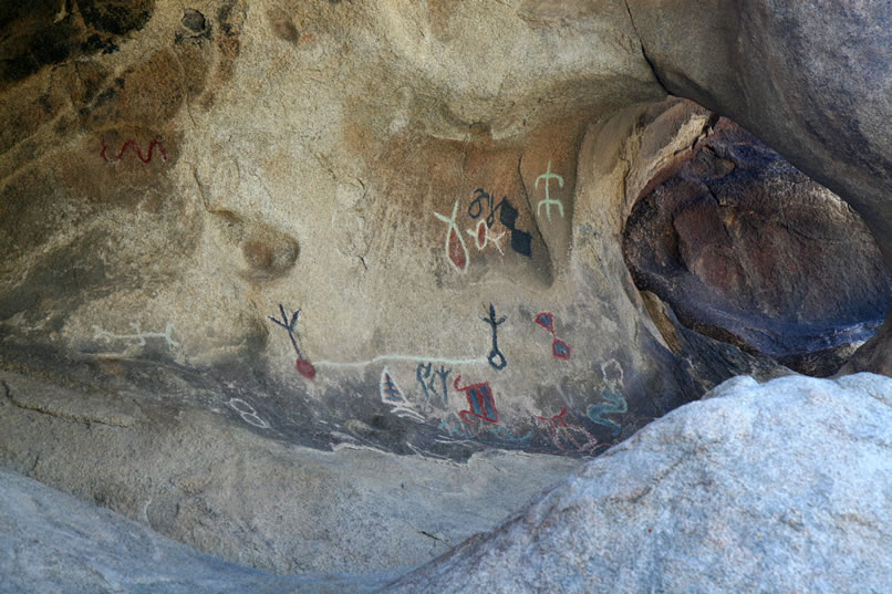 Next, since it's on our way, we stop at a well known pictograph site that has, unfortunately, been "improved" at some time in the past by having the pictographs painted over with modern pigments in an effort to enhance them.  The result is a cartoon version of what must have once been an impressive and intact site.