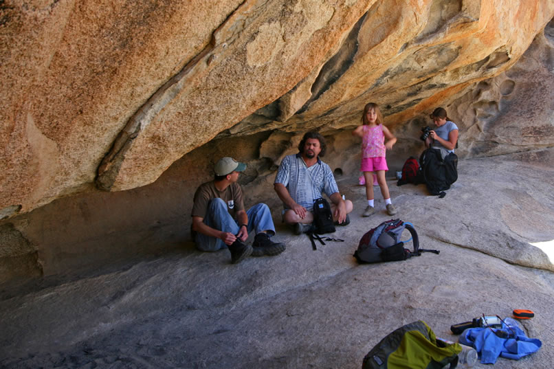 David, Matt, Kirsten and Niki enjoy the shade at the far end of the shelter.  Cindy is looking at the rock art and is not in this photo.