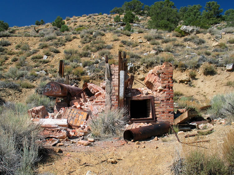 This brick two-pipe open hearth furnace, built in the late 1920's, was used to extract the liquid mercury from the ore until the new plant was built.