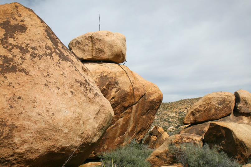 As we work around behind it, we find that the rod was wired up so that it functioned as a lightning rod.  But that's not the only mystery that gets solved.