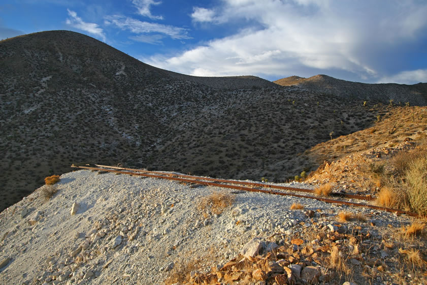 Just a little higher and we're up to the level of the main adit.  Here's one of the rails leading to the furthest tailings dump.