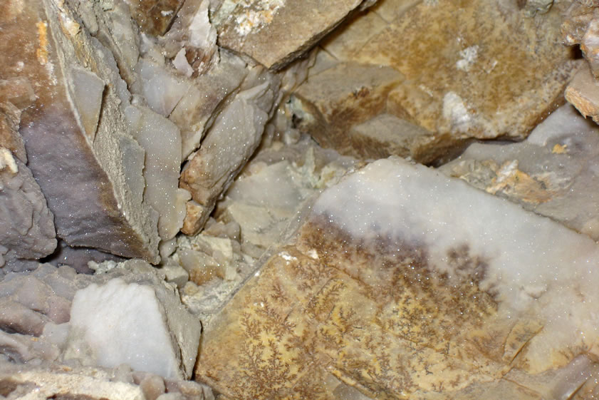 However, even in the midst of all this chaos, there are still some neat elements like this rock outcrop sprinkled with druzy quartz crystals.