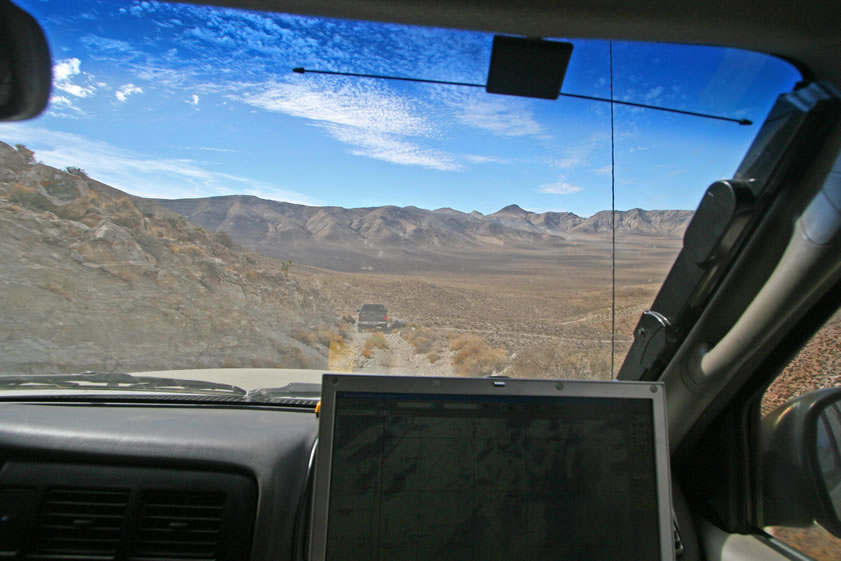 Well, our fearless tunnel crew emerged unscathed with plenty of stories to tell on hike back down to the vehicles.  Here we're dropping down from the Ubehebe Mine toward Ulida Flat and the road home.