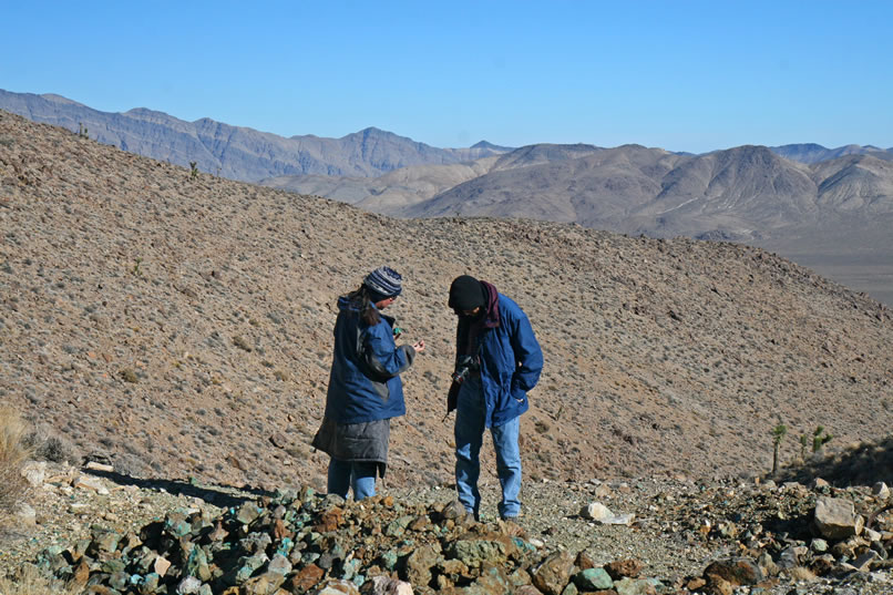 Guy and Alysia check out the colorful rocks on the tailings pile.