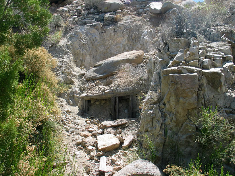 Just beyond the well are some wood timbers at what might have been part of an earlier attempt to get water.